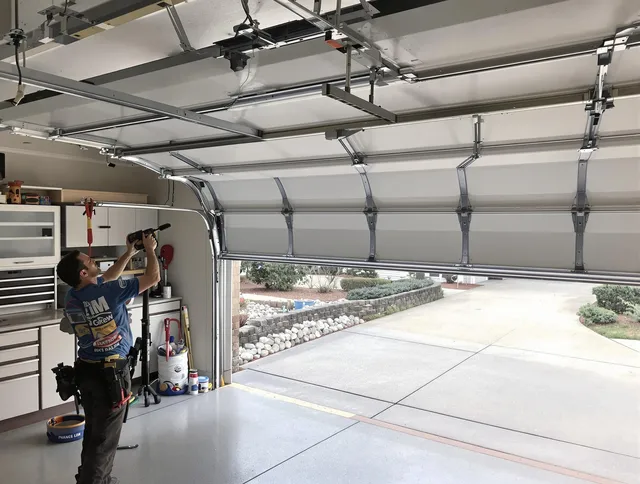 Garage door track repair service by Lyndhurst Garage Door Repair in Lyndhurst
